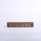 Engraved Brown Wood Welcome Sign