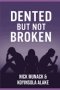 DENTED BUT NOT BROKEN