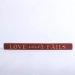 Love Never Fails Cherry Wood Engraved Sign